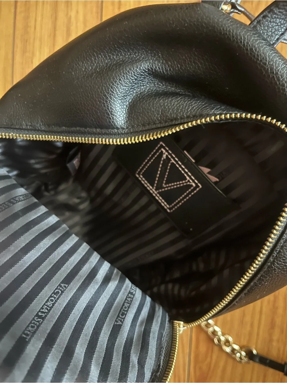 Victoria’s Secret Black Mini Backpack Purse with Gold Chain Detail